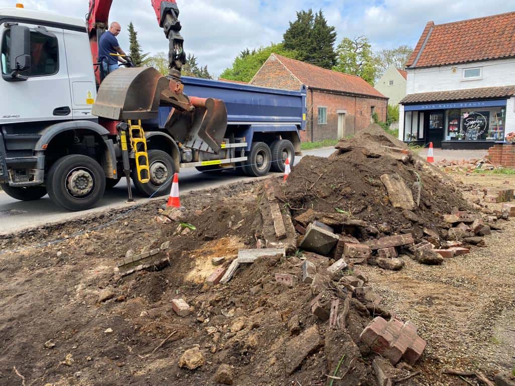 This is a photo of a dig out being carried out for the installation of a new tarmac driveway. Works being carried out by Bromham Driveways